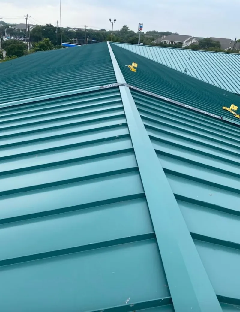 Green commercial metal roof ridge and valley for Metal Roof Repair in Clute